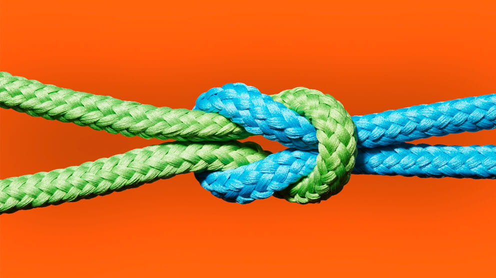 Two coloured ropes knotted together