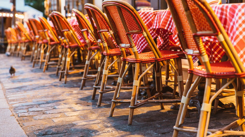 chairs and table at sidewalk