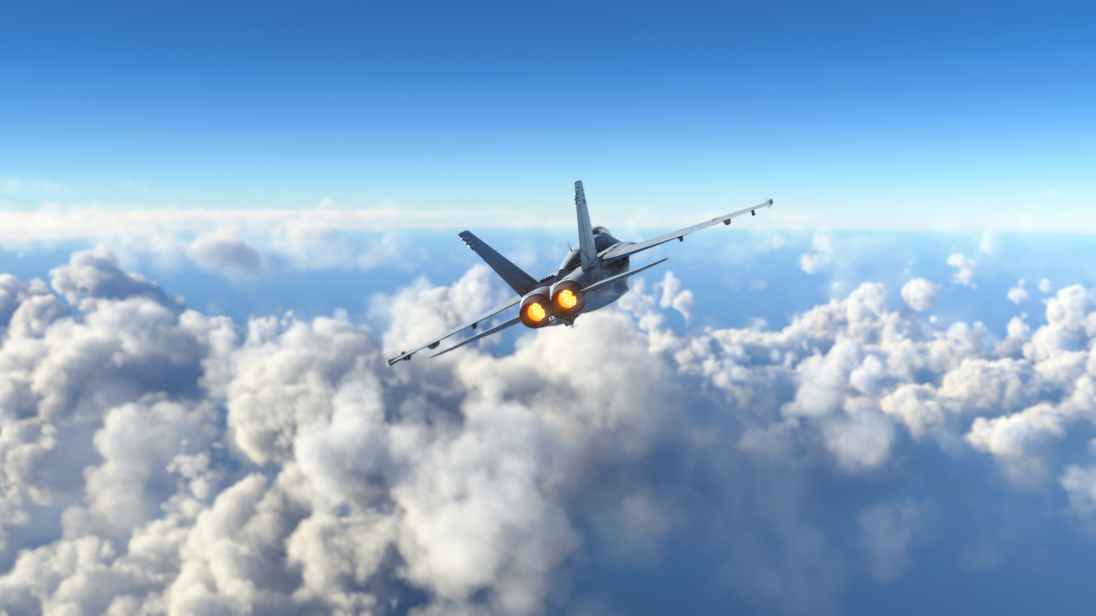 A military aircraft flying over the clouds as symbol for the defence sector