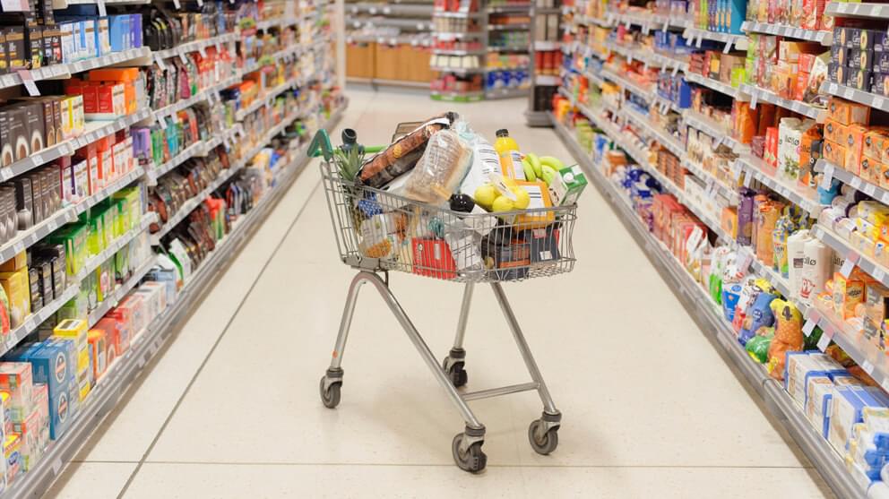 Full shopping cart in supermarket