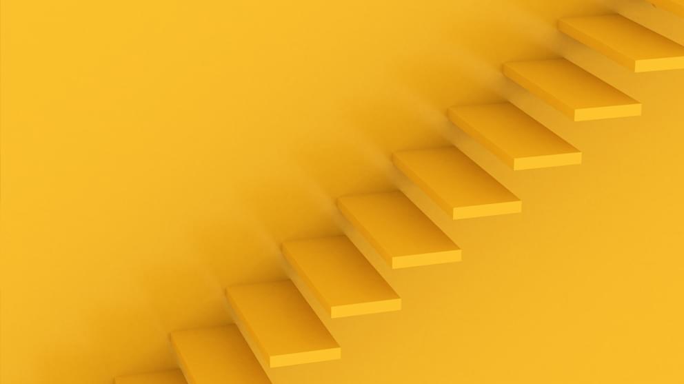 Stairs from left to right on an orange background