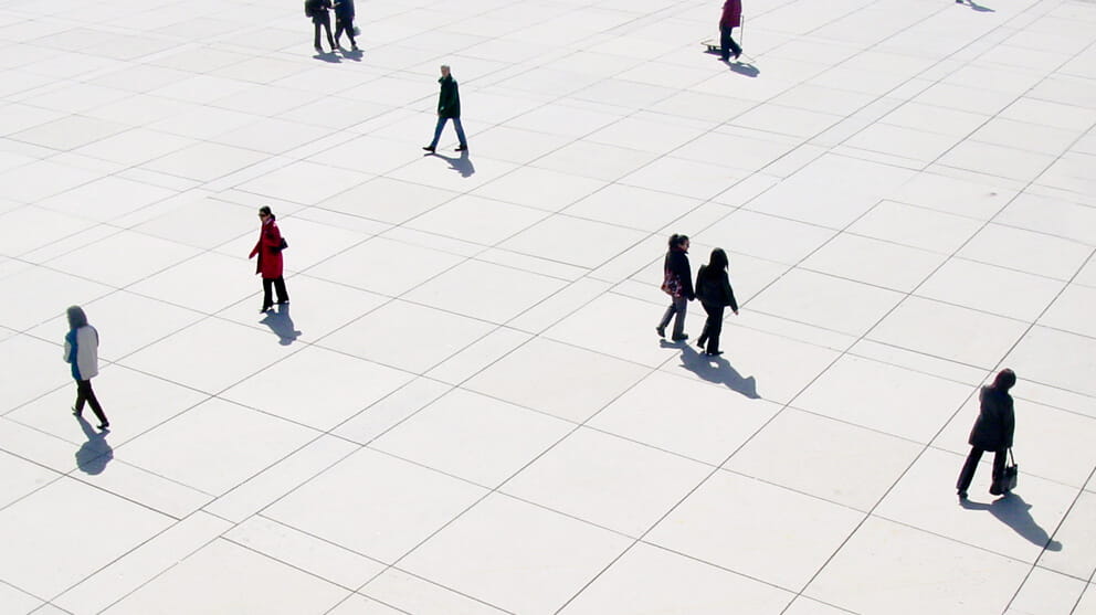 People crossing open space